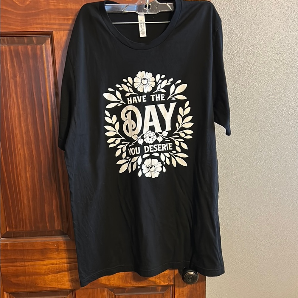 Black Graphic T-Shirt with White Floral Design